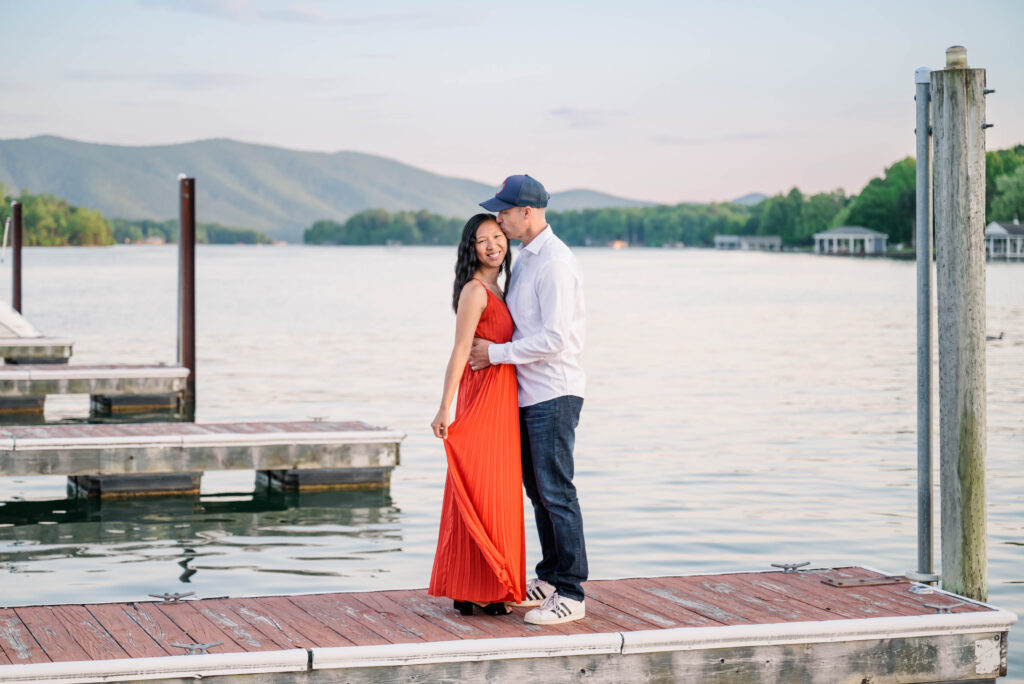 Couple standing on pier